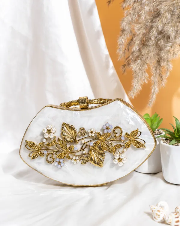 Noura_Embellished_MOP_Clutch_with_Floral_Gold_Detailing